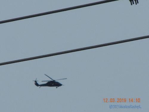 A lone Blackhawk seemingly patrolled the BigM area on Dec. 5, 2019. The power lines are those across the street from us. The helicopter is directly over BigM mountain in this image.