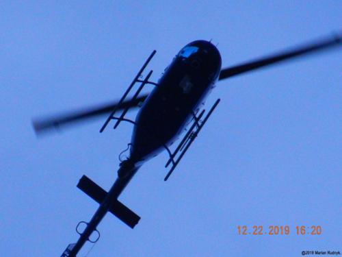 The helo makes a super low pass over me. Radar tracking websites blatantly falsified this helos location in an attempt to mislead the public. However, dozens of photos & nearly 15 minutes of video all confirmed its highly illegal actions (that violate strict FAA regulations). [(c)2019MarianRudnyk.]