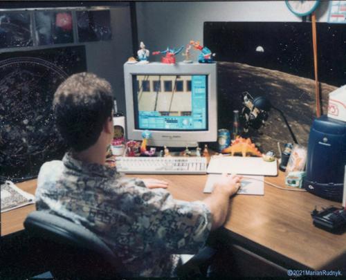 Here I am, on June 18, 1997, hard at work on a scene for the famous blockbuster feature film "TITANIC". A close look at my monitor reveals that this is a scene involving the  front bridge of the ship. Notice the star charts & space pix around me - my NASA roots were showing!
(c)1997MarianRudnyk.
