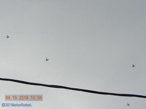 Low, loud & slow - this squadron of 4 military Osprey headed directly over my house (that's the power/cable wire over my front yard that connects to my home) & then turned & headed into the BigM canyons, on Sept. 15, 2019.