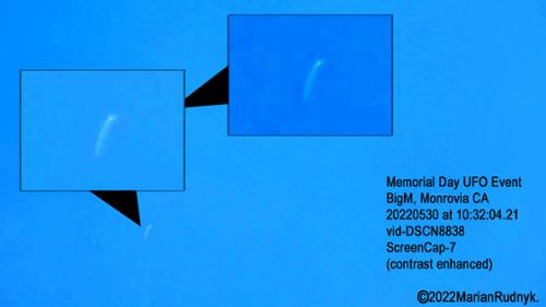 This is the last frame the object appears in. It had dropped in a near instantaneous burst of speed & stopped for a "sec" before leaving in a vertical burst of speed - & was gone. Here you can easily & plainly make out the tictac shape of this UFO. 